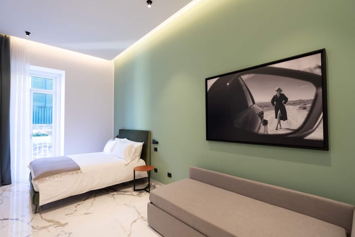 1 kamar tidur, seprai premium, selimut bulu angsa, dan minibar gratis