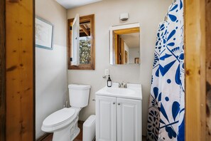 Shower, eco-friendly toiletries, towels, soap