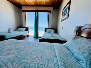 Premium Quadruple Room | Blackout drapes, free WiFi, bed sheets