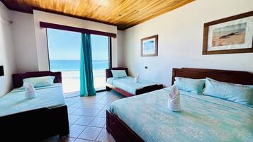 Premium Quadruple Room | Blackout drapes, free WiFi, bed sheets