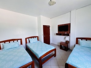 Standard Triple Room | Blackout drapes, free WiFi, bed sheets