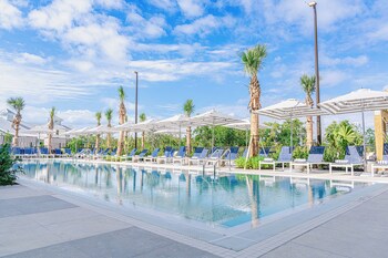 2 outdoor pools, cabanas (surcharge), pool umbrellas at The Perry Hotel Naples