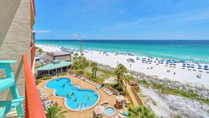 A resort with a swimming pool, beach, and ocean view. - Hidden Dunes 602 (Panama City Beach)