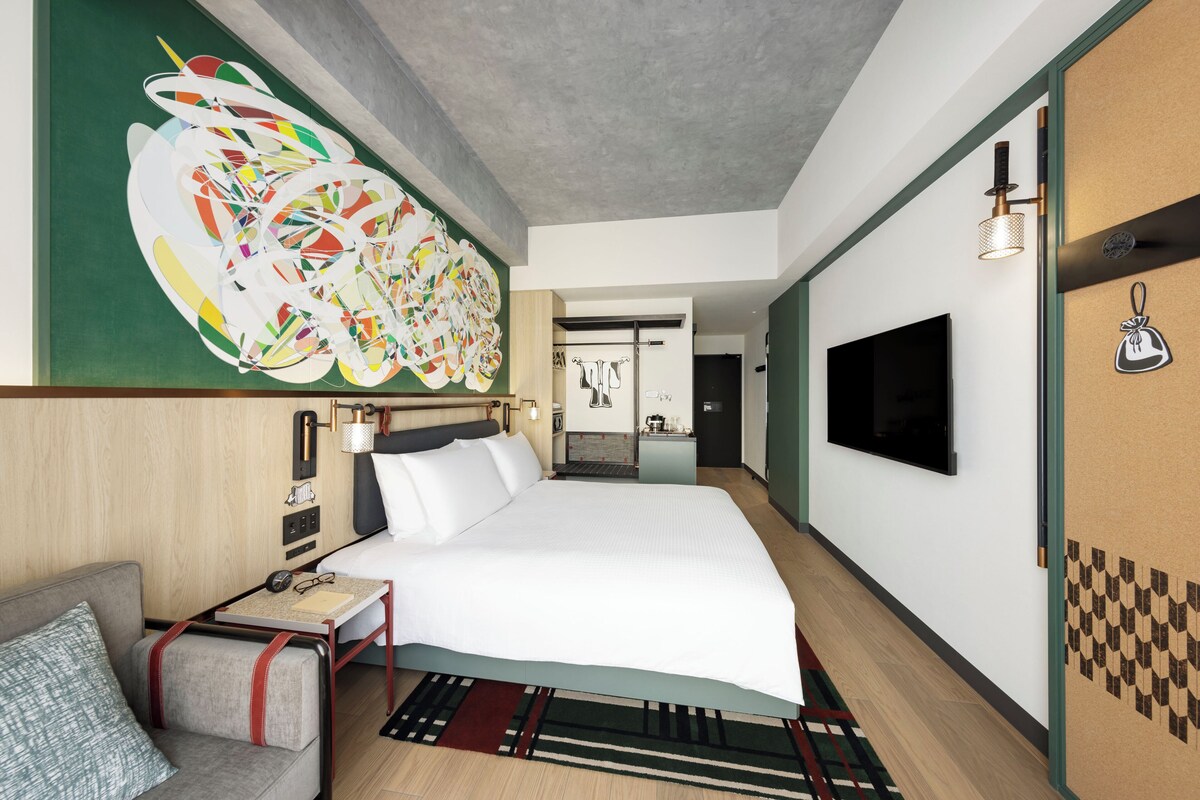 Down comforters, free minibar, in-room safe, desk
