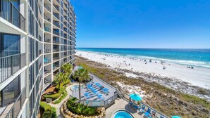 A high-rise hotel with a rooftop pool and beach view. - Edgewater Tower 2-408 (Panama City Beach)