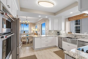 Condo, Multiple Beds (Indigo West 804) | Private kitchen | Oven, toaster, paper towels