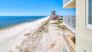 A beachfront hotel with a balcony overlooking the beach and ocean. - Summerchase 1107 (Orange Beach)