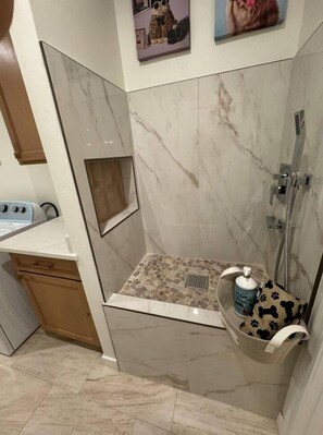 Shower, hair dryer, towels, soap