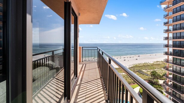 A balcony with a view of the beach and ocean. - Seachase 905c (Orange Beach)