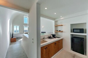 Fridge, coffee/tea maker, dining tables