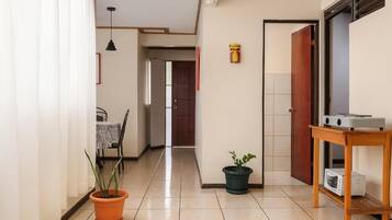 Basic Apartment | Living area | 32-inch LCD TV with cable channels