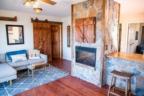 TV, fireplace - Lakefront Getaway, Private Dock, Porch, and Fishing! (Roxboro)