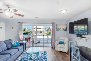 Condo, 1 King Bed with Sofa bed (St. Martin Beachwalk Villas 111) | Living area | TV - St. Martin Beachwalk Villas 111 (Destin)