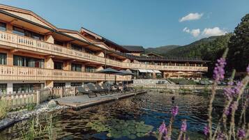 Seasonal outdoor pool, pool umbrellas, pool loungers