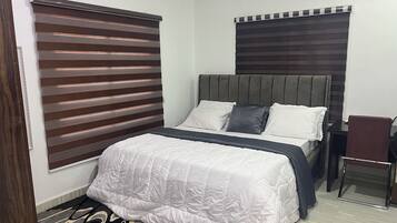 Habitación individual estándar | Escritorio y espacio para trabajar con un portátil