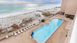 A pool area with a view of the beach and ocean. - Islander Beach Resort 6012 (Fort Walton Beach)