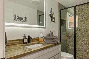 Hair dryer, towels, soap, shampoo