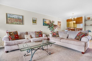 Condo, Multiple Beds (Emerald Isle 210) | Living area | TV - Emerald Isle 210 (Fort Walton Beach)