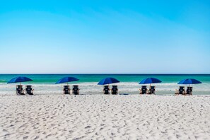Condo, Multiple Beds (Palms Resort #2713 Jr. 2BR) | Beach | On the beach