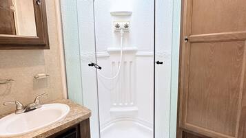 Shower, towels, soap, shampoo