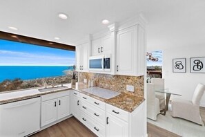 Fridge, microwave, oven, stovetop - Spectacular ocean view home, recently remodeled in the heart of Laguna Beach.   (Laguna Beach)