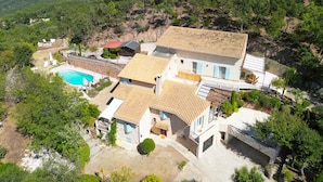 A hillside villa with a swimming pool, multiple rooms, and a view of the coastline. - Double Family Villa,12 people with Pool near Cannes (Fréjus)