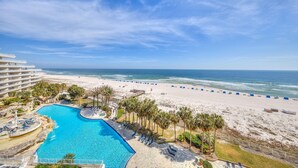 A resort with a swimming pool, beach, and ocean view. - Eden West 504 (Pensacola)