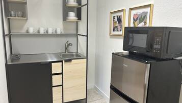 Microwave, coffee/tea maker, toaster, paper towels