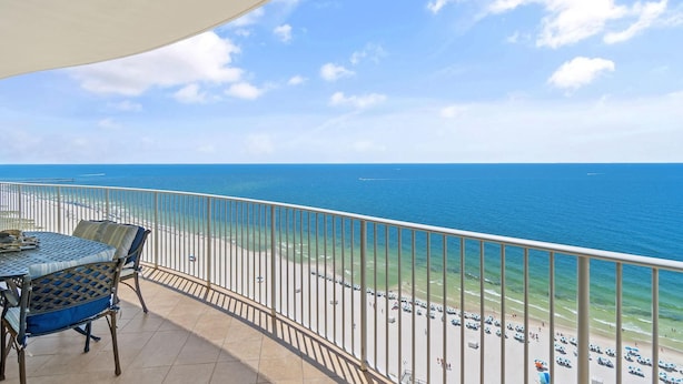 A balcony with a view of the ocean and beach. - Turquoise C1706 (Orange Beach)