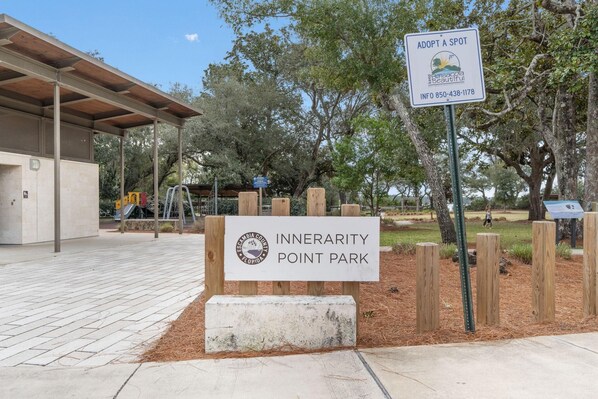 Enter Innerarity Point Park, a serene public space with a covered pavilion and playground for family fun.
