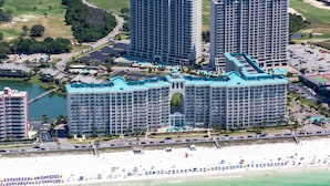 A large resort with multiple high-rise buildings, a beach, and a marina. - Ariel Dunes I 1403 (Miramar Beach)