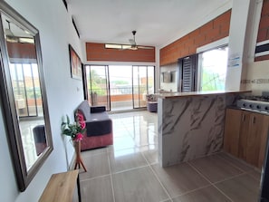 Family Apartment | Living area | Flat-screen TV