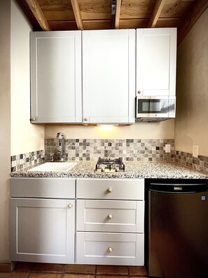 Fridge, microwave, stovetop, coffee/tea maker