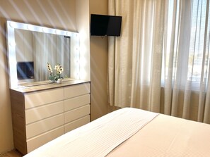 1 chambre, fer et planche à repasser, Wi-Fi gratuit, draps fournis