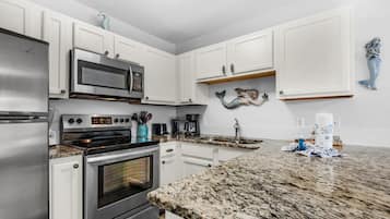 Condo, 1 Queen Bed with Sofa bed (Grand Caribbean West 303) | Private kitchen | Oven, toaster