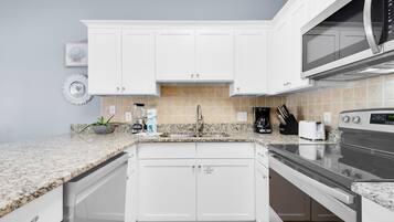 Condo, 1 King Bed with Sofa bed (Caribbean Dunes 121) | Private kitchen | Oven, toaster