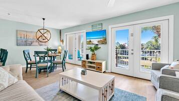 Condo, Multiple Beds (Gulf Place Caribbean 204) | Living area | TV