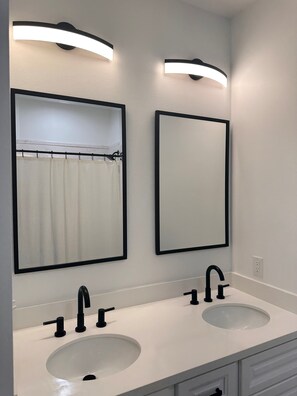 Hair dryer, towels, soap, shampoo