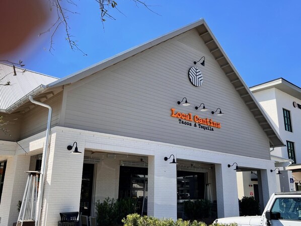 A building with a sign reading "Local Cantina Tacos & Tequila."