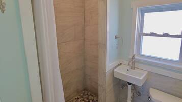 Shower, free toiletries, hair dryer, towels