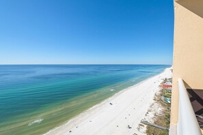 A beach view from a balcony with a clear sky. - Majestic Beach Towers 1-2314 (Panama City Beach)