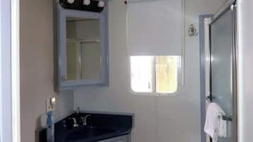 Shower, hair dryer, shampoo