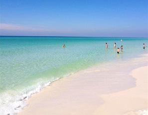 A beach with clear turquoise water and a sandy shore. - Village of South Walton B375 (Panama City Beach)