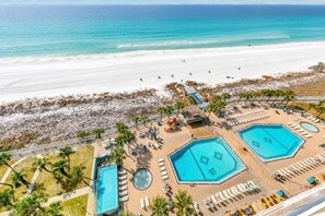 A resort with a large pool area, multiple swimming pools, and a beach. - The Summit 1323 (Panama City Beach)