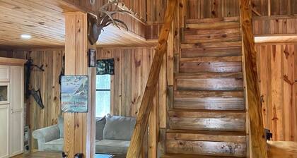 Rustic Cabin on 60 acres of wooded land.