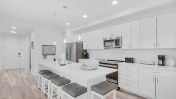 Condo, Multiple Beds (Gulf Place Residences 109) | Private kitchen | Oven, toaster