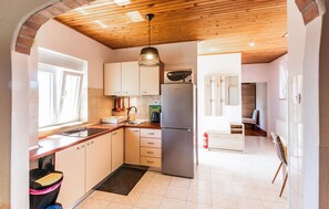 Fridge, stovetop, dishwasher, coffee/tea maker