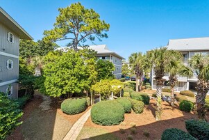 Apartamento, varias camas (Beachwood Villas 1A- Beach Haven) | Jardines del alojamiento