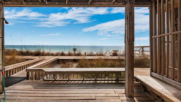A wooden deck with a view of the beach and ocean. - The Sand Trap- Costa del Sol C-9 (Miramar Beach)
