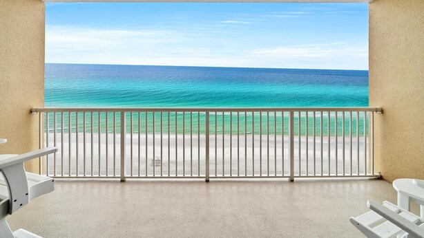 A balcony with a view of the ocean, a railing, and a concrete floor. - Majestic Beach Towers 1-1014 (Panama City Beach)